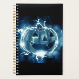 Agenda calabaza de Halloween bajo la lluvia