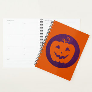 Agenda Calabaza Naranja de Halloween en fondo morado