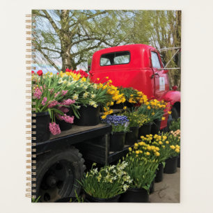 Agenda Camión rojo con flores de primavera y arcoiris