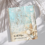 Agenda Concha de estrella de arena azul playa 2026<br><div class="desc">Un entorno rústico en la playa. Marisco,  arena,  concha y pez estrella. Personalice y agregue su nombre y un texto.</div>