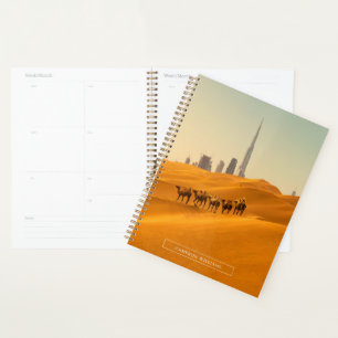 Agenda Desiertos Vista aérea de Dubai con camellos