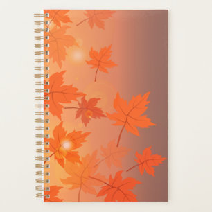 Agenda Diseño otoñal con hojas de arce y efecto bokeh