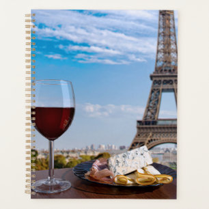 Agenda Dos copas de vino en un café en París