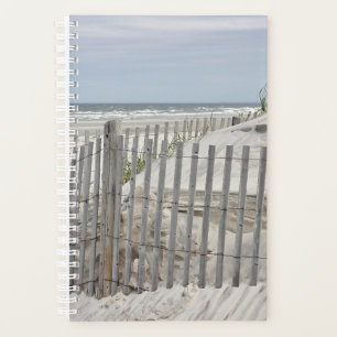 Agenda Dunas de arena y valla de playa