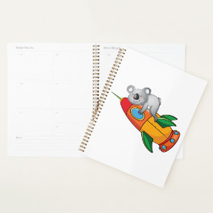 Agenda Durmiendo Koala en un cohete colorido