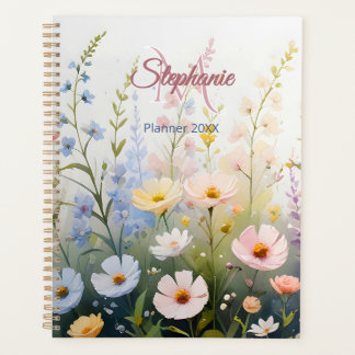 Agenda El prado de flores silvestres en un monograma con