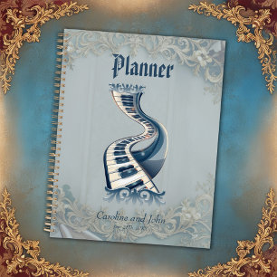 Agenda Elegancia en teclas de piano y flores.