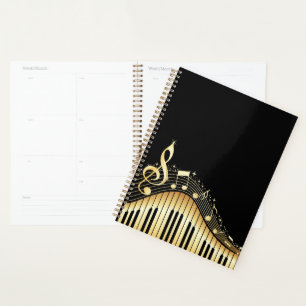 Agenda Elegante teclado de piano negro y dorado