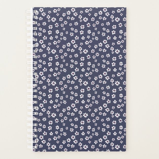 Agenda Flores blancas pequeñas en un planner azul (Anverso)