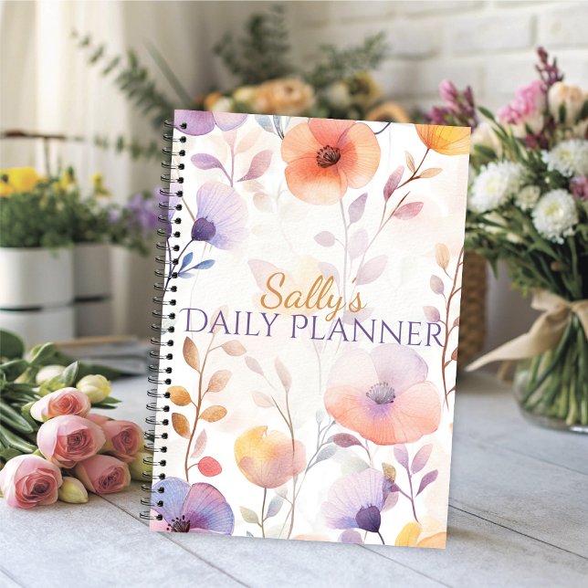 Agenda Flores Hermosas de Acuarela Suave (Watercolor floral daily planner with soft lavender and peach blooms.)