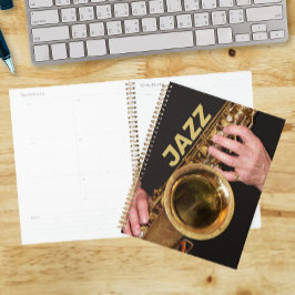 Agenda Fotomusico de jazz tocando saxofón de oro