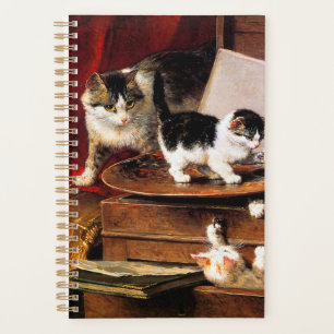 Agenda Gata madre y gatitos en la mesa