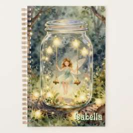Agenda Hada encantada en un frasco en un bosque mágico