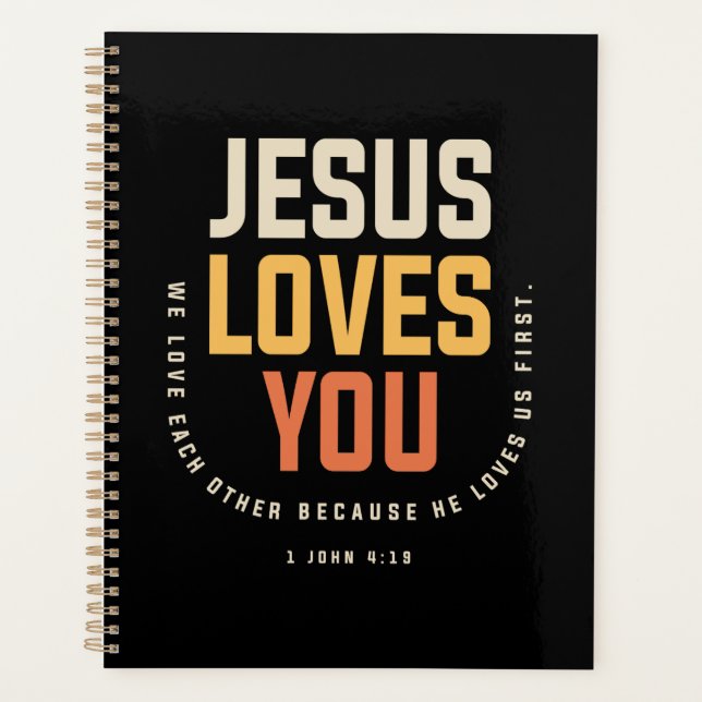 Agenda Jesús te ama - 1 Juan 4:19 Cristiano (Anverso)
