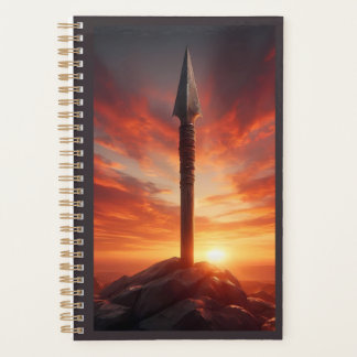 Agenda Lanza épica en un paisaje místico de puesta de sol