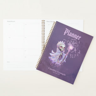 Agenda Melodías mágicas del lindo esqueleto morado.