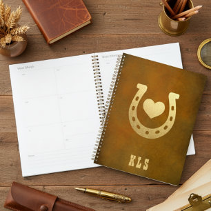 Agenda Monograma de herradura marrón y oro del tema occid
