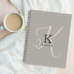 Agenda Monograma femenino elegante sobre fondo neutral<br><div class="desc">Elegante y bello, este exclusivo diseño de monograma femenino muestra la inicial de su nombre en un simple tipo de letra serif y un elegante tipo de letra caligráfica en el fondo. Su nombre se muestra debajo de su monograma inicial en este diseño personalizado de tipografía única. Los tres elementos...</div>