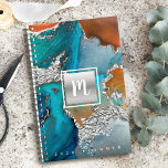 Agenda Monograma mármol acuarela color turquesa plateado<br><div class="desc">Un cuadrado de Relieve metalizado plateado brillante, falso, con un guión de tipografía monograma inicial sobre un rico fondo de color naranja plateado, azul turquesa y amarillo en esta moda, elegante, moderno, personalizado, planificador de nombres anuales. Personaliza con tu inicial. Este planificador viene en dos tamaños: pequeño (5.5"x8.5") y mediano...</div>