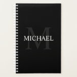 Agenda Monograma personalizado y nombre negro<br><div class="desc">El Monograma y el Nombre Personalizados Giftsee incluye un nombre personalizado en blanco y un monograma en gris como fondo,  en estilo de fuente serif clásico,  en fondo negro.

Perfecto como regalo de vacaciones,  regalo del padre para papá y regalo para cualquier ocasión especial.</div>