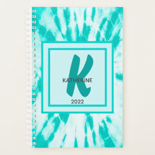 Agenda Monograma verde azulado de tinte de tinta y libro
