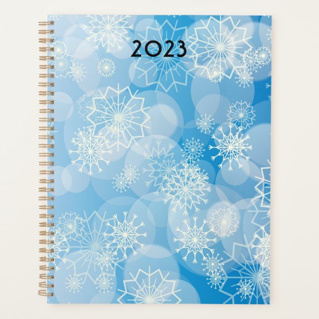Agenda Navidades con copos de nieve en un fondo azul (Anverso)
