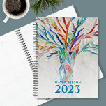 Agenda Nombre personalizado 2023<br><div class="desc">Este único Planner está decorado con un árbol de mosaico de colores vivos sobre un fondo gris claro. Personalizar con tu nombre y año. Para seguir editando, utilice la Herramienta de diseño para cambiar el tipo de letra, el tamaño de la fuente o el color. Porque creamos nuestra obra de...</div>