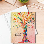 Agenda Nombre personalizado de colores arcoiris del árbol<br><div class="desc">Este Planner único está decorado con un mosaico de color arcoiris de la Tierra de la Vida sobre un fondo verde pálido. El diseño original se hizo con pequeños trozos de vidrio de colores vivos. Personalizar con tu nombre y año. Mosaico original © Michele Davies.</div>
