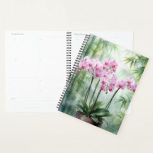 Agenda Orquídeas rosadas sobre fondo de bambú verde