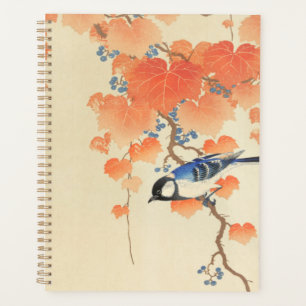 Agenda Pájaro azul en un árbol de Paulownia 