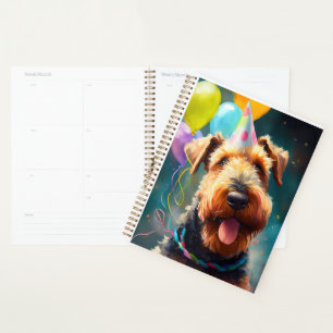 Agenda Perro Airedale con gorra de cumpleaños y globos