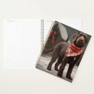 Agenda Perro de caza de pelo duro en Navidad con nieve