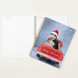 Agenda Perro Husky Siberiano en un camión de Navidades se