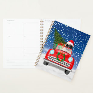Agenda Perro Pug conduciendo coche en Navidad nieve