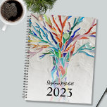 Agenda Personalizado 2023<br><div class="desc">Este único Planner está decorado con un árbol de mosaico de colores vivos sobre un fondo gris claro. Personalizable fácil. Para seguir editando, utilice la Herramienta de diseño para cambiar el tipo de letra, el tamaño de la fuente o el color. Porque creamos nuestra obra de arte no encontrarás esta...</div>