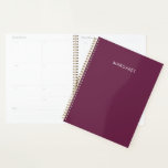 Agenda Personalized Burgundy Custom Name Planner<br><div class="desc">This personalized burgundy custom name planner combines a rich elegant cover with practical layout to keep your daily tasks and goals in order. Featuring your chosen name for a unique touch, it is perfect for school, work, or personal scheduling while adding a stylish and organized feel to your everyday planning...</div>
