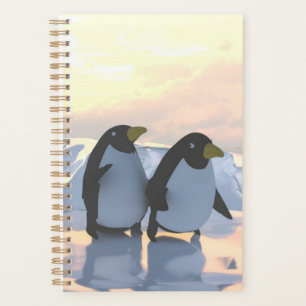 Agenda pingüinos relajándose en un témpano de hielo