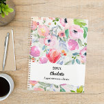 Agenda Pink purple watercolored flowers 2026<br><div class="desc">Watercolored flowers in blush pink and purple. A soft blush pink background,  decorated with a large bow.</div>
