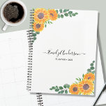 Agenda Planner Personalizado de Eucalyptus 2023<br><div class="desc">Este Planner floral está decorado con girasoles acuáticos y hojas de eucaliptos verdes sobre un fondo blanco. Puede personalizarlo agregando su nombre,  monograma y año. Porque creamos nuestra propia obra de arte no encontrarás esta imagen exacta de otros diseñadores. Acuarela original © Michele Davies.</div>