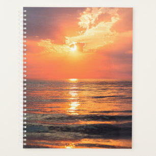 Agenda puesta de sol sobre el agua
