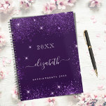 Agenda Purple glitter name script 2023<br><div class="desc">Deep purple background, white text. Decorated with faux glitter dust. Personalize and add a year, your first name and a title. The name is written with a modern hand lettered style script with swashes. To keep the swashes only delete the sample name, leave the spaces or emoji's in front and...</div>