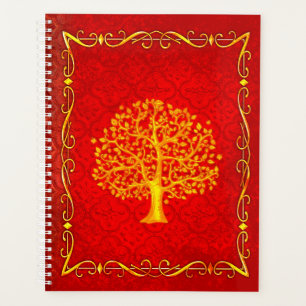 Agenda Santo Tomé de cuero rojo y dorado
