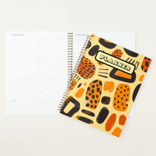 Agenda "Savanna Pop: Vibes tribales en Naranja y negro"