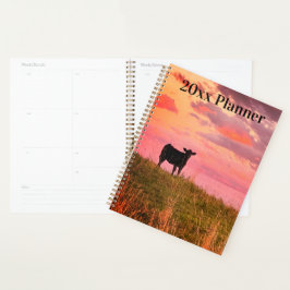 Agenda Silhouette de vaca al atardecer