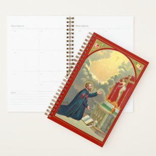 Agenda St. Camillus rezando ante un crucifijo (M 020)
