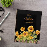 Agenda Sunflowers black 2025<br><div class="desc">Aprovecha tus habilidades organizativas con nuestro Planner de Espiral del Jardín del Girasol. Perfecto para mantenerse a la altura de su horario con un toque de encanto rústico, este planificador combina funcionalidad con un diseño hermoso y personalizado. Elegante fondo negro: el sofisticado fondo negro ofrece un sorprendente contraste, haciendo que...</div>