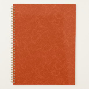 Agenda Superficie texturizada naranja con patrón de remol