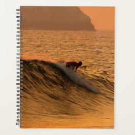 Agenda Surfer at sunset in Mexico