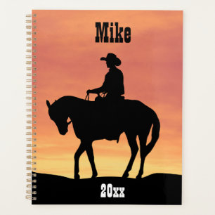 Agenda Vaquero a caballo al atardecer