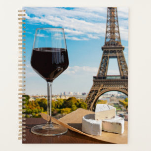 Agenda Vidrio de vino con queso brie en la torre Eiffel